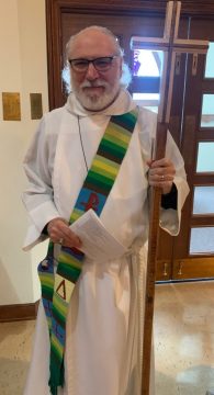 Deacon Don robed